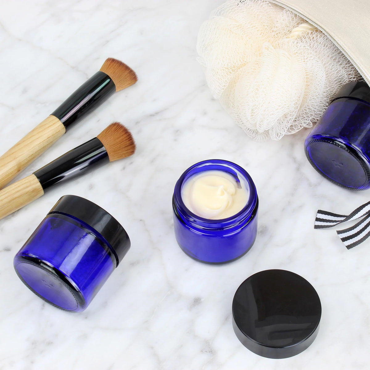 2 oz Cobalt Blue Glass Cosmetic Jars 12-Pack with Black Lined Lids V508